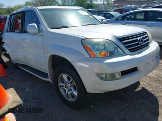 2007 Lexus GX with VIN JTJBT20X570145387, listed as a IAAI auction lot 42016545 with 153,907 mi miles. Bid and sale history available at carsss.com. Image 1.