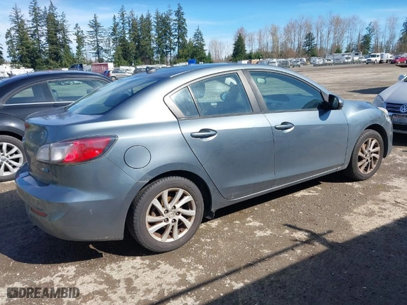 2012 Mazda Mazda3 i Grand Touring with VIN JM1BL1W81C1670836, listed as a IAAI auction lot 41885507 with 242,280 mi miles. Bid and sale history available at carsss.com. Image 4.