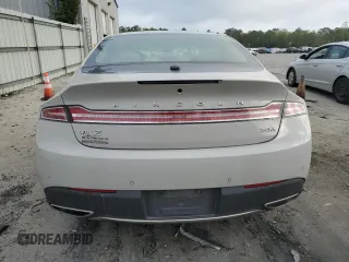 2019 Lincoln MKZ Hybrid Reserve II with VIN 3LN6L5MU9KR633669, listed as a Copart auction lot 51943355 with 98,581 mi miles and Salvage title. Bid and sale history available at DreamBid. Image 6.