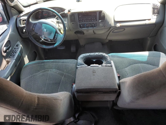 2001 Ford F-150 XLT с VIN 1FTRW07L01KF03457, выставлен на аукционе Copart как лот 60086725 с пробегом 205 917 миль миль и Списание • Salvage title. История ставок и продаж доступна на DreamBid. Изображение 8.