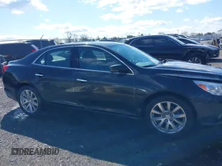 2016 Chevrolet Malibu LTZ with VIN 1G11E5SA4GU120792, listed as a IAAI auction lot 42019739 with 260,487 mi miles and . Bid and sale history available at DreamBid. Image 14.