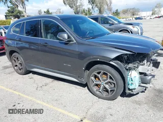2018 BMW X1 sDrive28i with VIN WBXHU7C36J5L05628, listed as a IAAI auction lot 41708522 with 91,352 mi miles and . Bid and sale history available at DreamBid. Image 1.