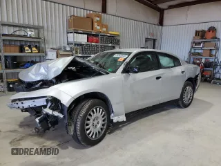 2020 Dodge Charger Police with VIN 2C3CDXKT1LH204974, listed as a Copart auction lot 50885845 with 133,706 mi miles and Salvage title. Bid and sale history available at DreamBid. Image 1.