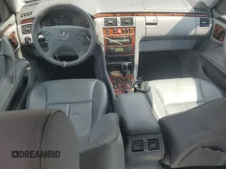 2001 Mercedes-Benz E-Class with VIN WDBJH65J41B201471, listed as a Copart auction lot 68863194 with 106,893 mi miles and Salvage Title. Bid and sale history available at carsss.com. Image 8.