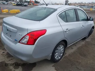 2012 Nissan Versa SL with VIN 3N1CN7AP6CL897158, listed as a IAAI auction lot 41729588 with 98,534 mi miles. Bid and sale history available at carsss.com. Image 4.