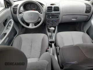 2005 Hyundai Accent GLS z VIN KMHCG45C75U639281, wystawiony jako Copart lot #54887095 z przebiegiem 136 090 mil mil oraz Szkoda całkowita • Salvage title. Historia ofert i sprzedaży dostępna na DreamBid. Obrazek 8.