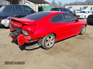 2004 Pontiac GTO with VIN 6G2VX12GX4L269345, listed as a IAAI auction lot 41692402 with 174,146 mi miles. Bid and sale history available at carsss.com. Image 4.