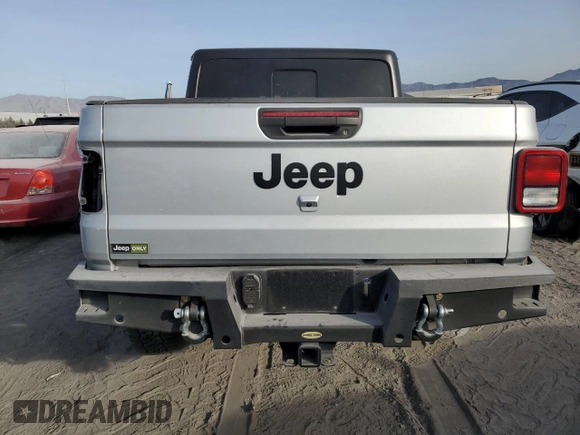 2022 Jeep Gladiator Willys z VIN 1C6HJTAG9NL113410, wystawiony jako Copart lot #43236565 z przebiegiem 39 804 mil mil oraz Szkoda całkowita • Salvage title. Historia ofert i sprzedaży dostępna na DreamBid. Obrazek 6.