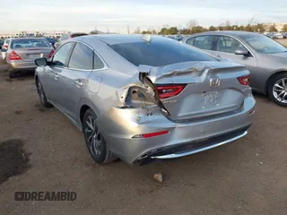 2021 Honda Insight Touring with VIN 19XZE4F99ME009749, listed as a IAAI auction lot 41411868 with 54,808 mi miles and . Bid and sale history available at carsss.com. Image 3.