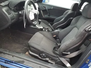 2004 Hyundai Tiburon GT z VIN KMHHN65F04U116166, wystawiony jako Copart lot #51525065 z przebiegiem 153 035 mil mil oraz Szkody całkowita. Historia ofert i sprzedaży dostępna na DreamBid. Obrazek 7.