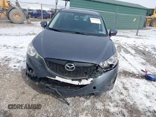 2013 Mazda CX-5 Sport z VIN JM3KE2BE9D0156274, wystawiony jako IAAI lot #41624466 z przebiegiem 159 017 mil mil oraz . Historia ofert i sprzedaży dostępna na DreamBid. Obrazek 6.