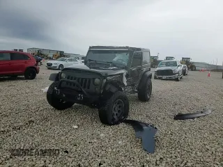 2017 Jeep Wrangler Willys Wheeler with VIN 1C4AJWAG9HL673766, listed as a Copart auction lot 43132555 with 129,422 mi miles and Salvage Title. Bid and sale history available at DreamBid. Image 11.