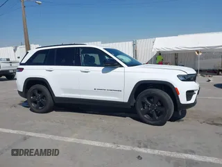 2023 Jeep Grand Cherokee Laredo with VIN 1C4RJHAGXPC660392, listed as a IAAI auction lot 41845564 with 7,444 mi miles and . Bid and sale history available at DreamBid. Image 13.