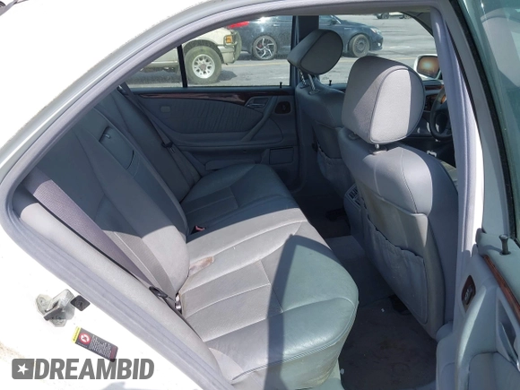 2002 Mercedes-Benz E-Class with VIN WDBJF65J22B432263, listed as a IAAI auction lot 42130545 with 220,852 mi miles. Bid and sale history available at carsss.com. Image 8.