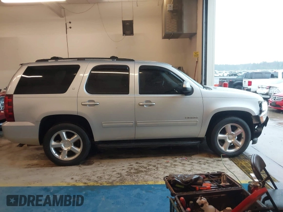 2010 Chevrolet Tahoe LT with VIN 1GNMCBE35AR114622, listed as a IAAI auction lot 41974795 with 248,109 mi miles and . Bid and sale history available at DreamBid. Image 13.
