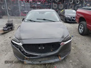 2021 Mazda Mazda6 Touring with VIN JM1GL1VM9M1603830, listed as a IAAI auction lot 41531133 with 73,588 mi miles. Bid and sale history available at carsss.com. Image 12.