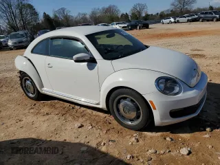 2012 Volkswagen Beetle 2.5L with VIN 3VWJX7AT5CM618298, listed as a Copart auction lot 49159415 with 151,507 mi miles and Salvage Title. Bid and sale history available at carsss.com. Image 4.