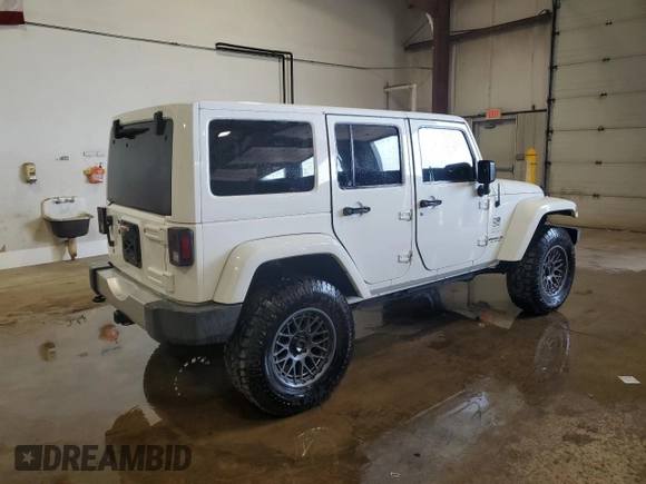 2015 Jeep Wrangler Unlimited Sahara с VIN 1C4HJWEG0FL560973, выставлен на аукционе Copart как лот 59552135 с пробегом 135 057 миль миль и Чистый • Clean title. История ставок и продаж доступна на DreamBid. Изображение 3.