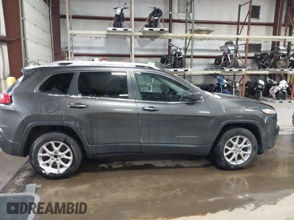 2014 Jeep Cherokee Latitude with VIN 1C4PJMCS0EW213826, listed as a IAAI auction lot 41322537 with 272,659 mi miles and . Bid and sale history available at DreamBid. Image 13.