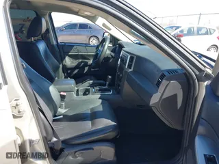 2010 Jeep Grand Cherokee Laredo with VIN 1J4PS4GK1AC111965, listed as a IAAI auction lot 41776362 with 209,042 mi miles. Bid and sale history available at carsss.com. Image 5.