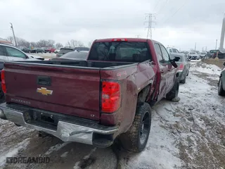 2016 Chevrolet Silverado 1500 LT with VIN 1GCVKRECXGZ339183, listed as a IAAI auction lot 41407017 with 121,373 mi miles. Bid and sale history available at carsss.com. Image 4.
