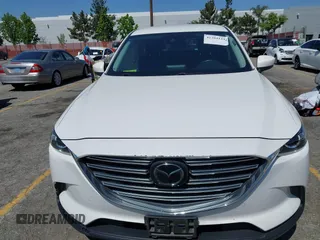 2020 Mazda CX-9 Sport with VIN JM3TCABY1L0406720, listed as a IAAI auction lot 42304144 with 75,887 mi miles and . Bid and sale history available at DreamBid. Image 12.