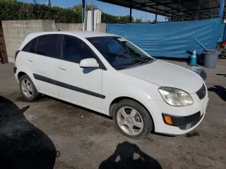 2006 Kia Rio SX with VIN KNADE163066058381, listed as a Copart auction lot 72277274 with 112,802 mi miles and Salvage Title. Bid and sale history available at carsss.com. Image 4.