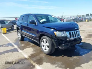 2012 Jeep Grand Cherokee Laredo with VIN 1C4RJFAG0CC160255, listed as a IAAI auction lot 41967809 with 127,702 mi miles. Bid and sale history available at carsss.com. Image 1.