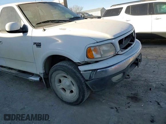 1999 Ford F-150 XL с VIN 1FTRX08L3XKB18916, выставлен на аукционе Copart как лот 81892064 с пробегом 175 280 миль миль и Списание • Salvage title. История ставок и продаж доступна на DreamBid. Изображение 11.