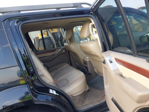 2012 Nissan Pathfinder LE with VIN 5N1AR1NN5CC607403, listed as a IAAI auction lot 41813677 with 217,854 mi miles. Bid and sale history available at carsss.com. Image 8.