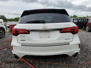 2019 Acura MDX Technology с VIN 5J8YD4H03KL014898, выставлен на аукционе Copart как лот 58891545 с пробегом 115 487 миль миль и Списание • Salvage title. История ставок и продаж доступна на DreamBid. Изображение 6.