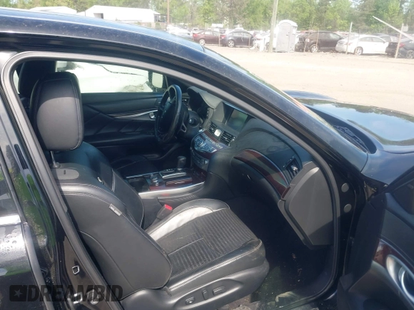 2013 Infiniti M with VIN JN1AY1AR6DM590187, listed as a IAAI auction lot 42096806 with 182,909 mi miles and . Bid and sale history available at DreamBid. Image 5.