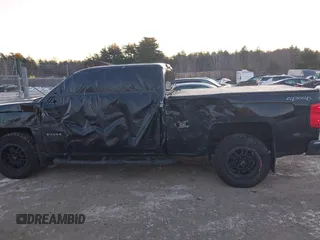 2014 Chevrolet Silverado 1500 LT with VIN 1GCVKREC0EZ399955, listed as a IAAI auction lot 41328346 with 111,162 mi miles and . Bid and sale history available at DreamBid. Image 14.