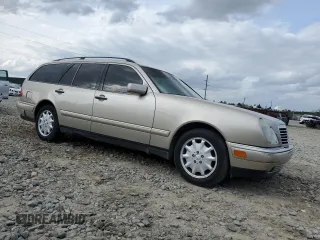 1998 Mercedes-Benz E-Class with VIN WDBJH65F7WA546101, listed as a Copart auction lot 47098945 with 227,453 mi miles and Salvage Title. Bid and sale history available at carsss.com. Image 4.