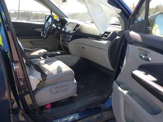 2017 Honda Pilot Touring with VIN 5FNYF6H98HB020341, listed as a IAAI auction lot 42037156 with 73,511 mi miles and . Bid and sale history available at DreamBid. Image 5.