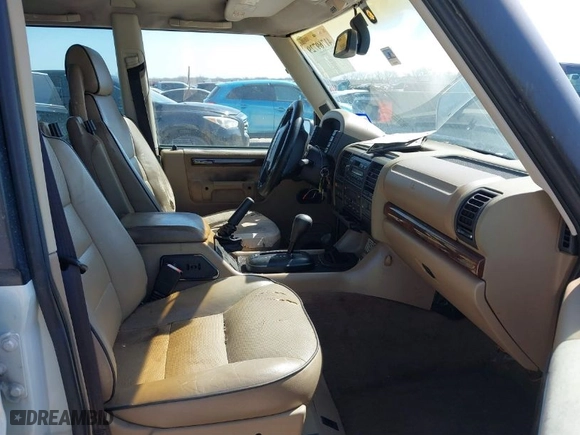 2000 Land Rover Discovery Series II w/Cloth with VIN SALTY124XYA262828, listed as a IAAI auction lot 41769729 with 215,711 mi miles. Bid and sale history available at carsss.com. Image 5.