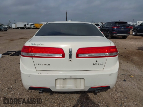 2012 Lincoln MKZ z VIN 3LNHL2GC5CR821004, wystawiony jako IAAI lot #41920319 z przebiegiem 91 081 mil mil oraz . Historia ofert i sprzedaży dostępna na DreamBid. Obrazek 16.