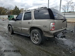 2001 GMC Yukon SLT z VIN 1GKEC13T51J145673, wystawiony jako Copart lot #83568954 z przebiegiem 310 415 mil mil oraz Szkoda całkowita • Salvage title. Historia ofert i sprzedaży dostępna na DreamBid. Obrazek 2.
