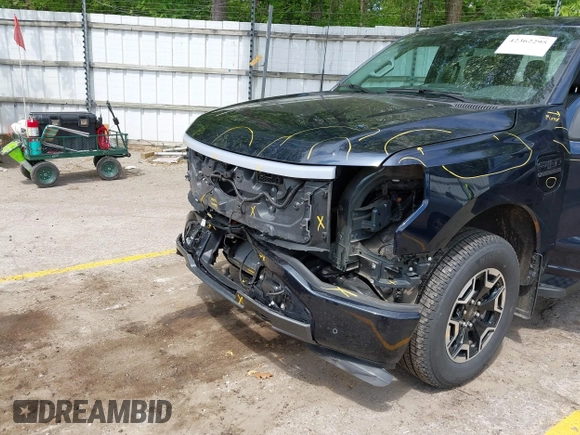 2023 Ford F-150 Lightning Pro with VIN 1FTVW1EL6PWG30061, listed as a IAAI auction lot 42362295 with 22,481 mi miles and . Bid and sale history available at DreamBid. Image 6.