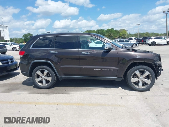 2016 Jeep Grand Cherokee Limited 75th Anniversary with VIN 1C4RJFBG0GC492720, listed as a IAAI auction lot 42073930 with 119,539 mi miles and . Bid and sale history available at DreamBid. Image 14.