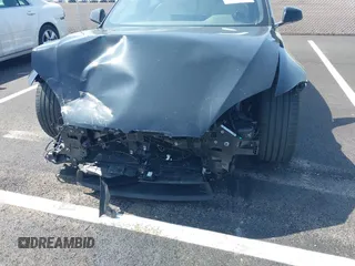 2022 Tesla Model S z VIN 5YJSA1E56NF490064, wystawiony jako IAAI lot #41858477 z przebiegiem Nie podano mil oraz . Historia ofert i sprzedaży dostępna na DreamBid. Obrazek 6.