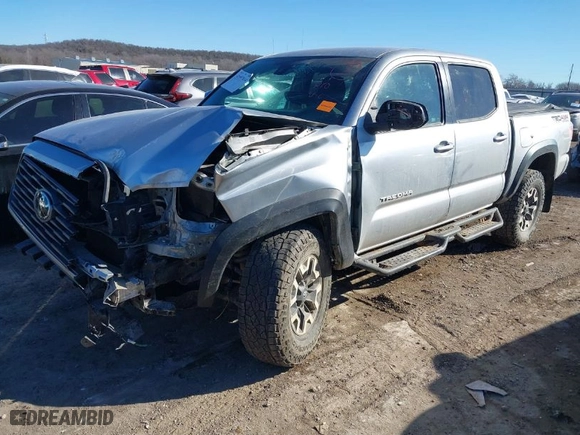 2022 Toyota Tacoma 4WD SR with VIN 3TYCZ5ANXNT077526, listed as a IAAI auction lot 41597014 with 71,103 mi miles. Bid and sale history available at carsss.com. Image 2.