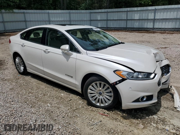 2015 Ford Fusion SE Hybrid with VIN 3FA6P0LU1FR210884, listed as a Copart auction lot 60035595 with 125,798 mi miles and Salvage title. Bid and sale history available at DreamBid. Image 4.