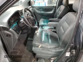 2003 Honda Odyssey EX-L z VIN 5FNRL18943B020961, wystawiony jako Copart lot #86009874 z przebiegiem 155 993 mil mil oraz Szkoda całkowita • Salvage title. Historia ofert i sprzedaży dostępna na DreamBid. Obrazek 7.