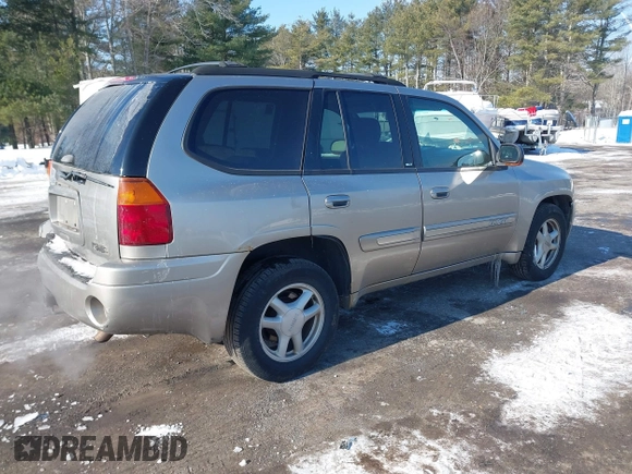 2002 GMC Envoy SLT with VIN 1GKDT13S822154592, listed as a IAAI auction lot 41389285 with 153,897 mi miles. Bid and sale history available at carsss.com. Image 4.