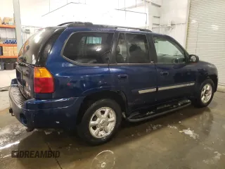 2003 GMC Envoy SLT with VIN 1GKDT13S132184373, listed as a Copart auction lot 46138705 with 130,612 mi miles and Salvage Title. Bid and sale history available at carsss.com. Image 3.