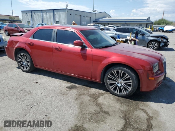 2010 Chrysler 300 with VIN 2C3CA2CV4AH330352, listed as a Copart auction lot 70720414 with 164,673 mi miles and Salvage Title. Bid and sale history available at carsss.com. Image 4.