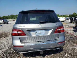 2014 Mercedes-Benz M 350 with VIN 4JGDA2EB4EA406865, listed as a Copart auction lot 61630045 with 142,616 mi miles and Salvage title. Bid and sale history available at DreamBid. Image 6.