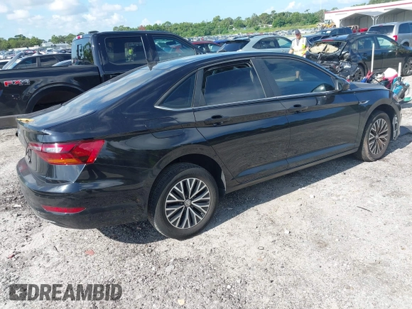 2019 Volkswagen Jetta SEL with VIN 3VWEB7BU7KM193642, listed as a IAAI auction lot 42718572 with 124,633 mi miles and . Bid and sale history available at DreamBid. Image 4.