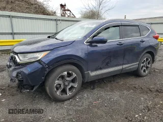 2017 Honda CR-V Touring with VIN 2HKRW2H96HH636330, listed as a Copart auction lot 52843185 with 84,604 mi miles and Salvage Title. Bid and sale history available at carsss.com. Image 1.